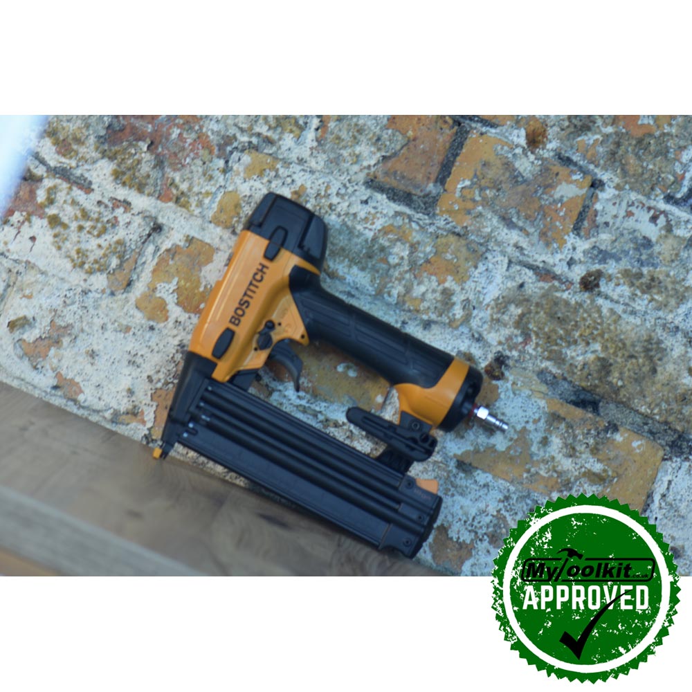 Stanley Bostitch 18 Gauge Brad Nailer (15-50mm) BT1855-E distant image against a brick wall