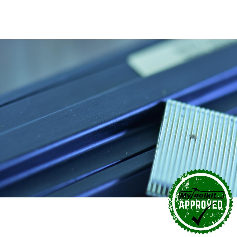14 series staples close up next to airtool magazine