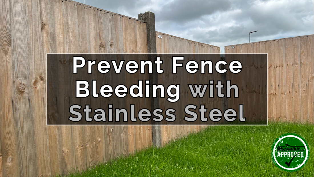 An image of feather edge fences in a garden but  the nails have caused bleeding down the fences.