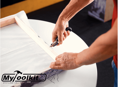 Rapid R3 Staple Remover being used on a canvas