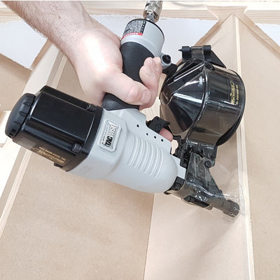 DCN50LHH2 Tacwise 2.1 Conical Mini Coil Nailer in joinery workshop on stairs